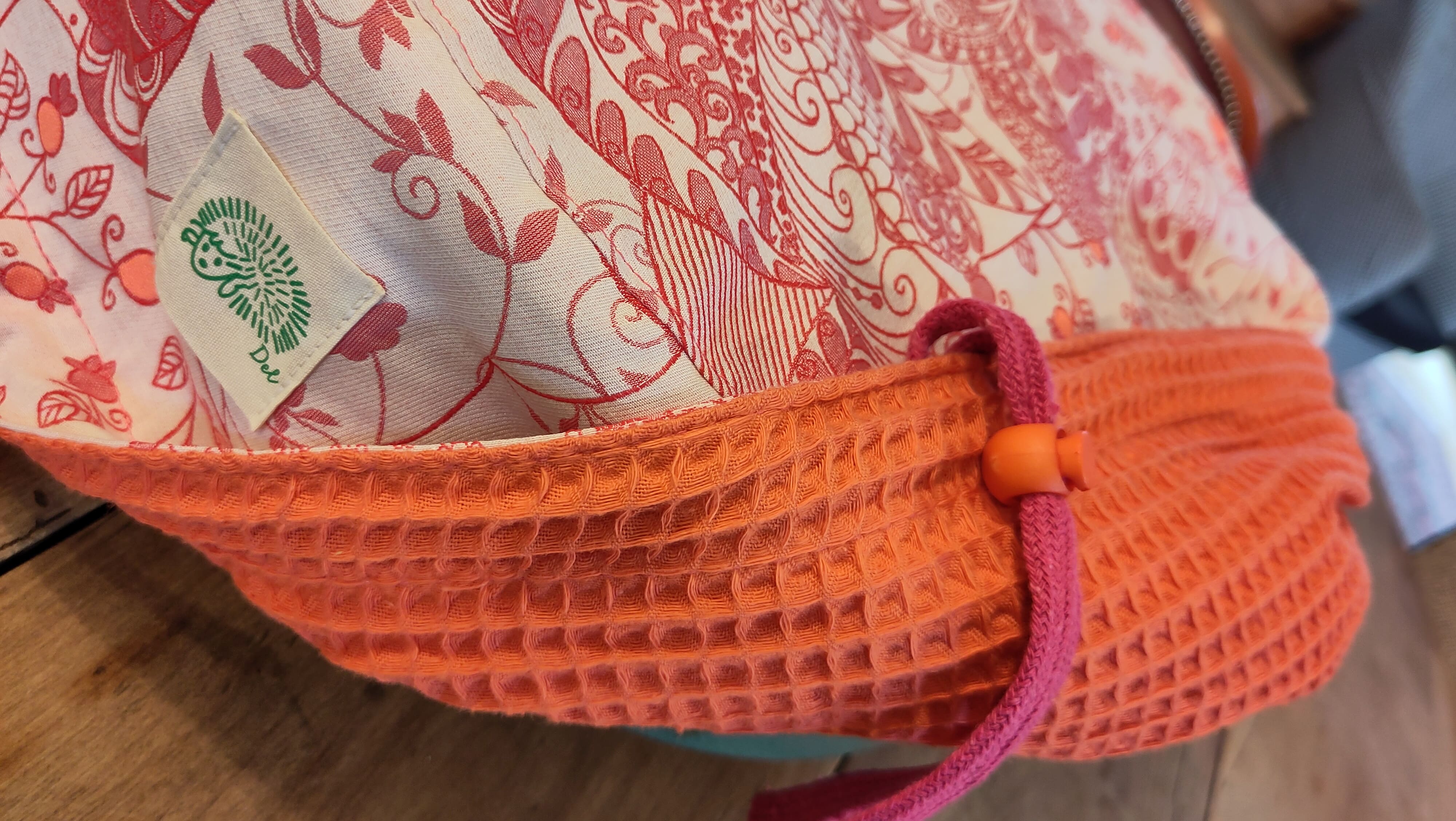 Jasmina-bis Housse de billig avec des motif à fleur rose et un nid d'abeille orange fluo